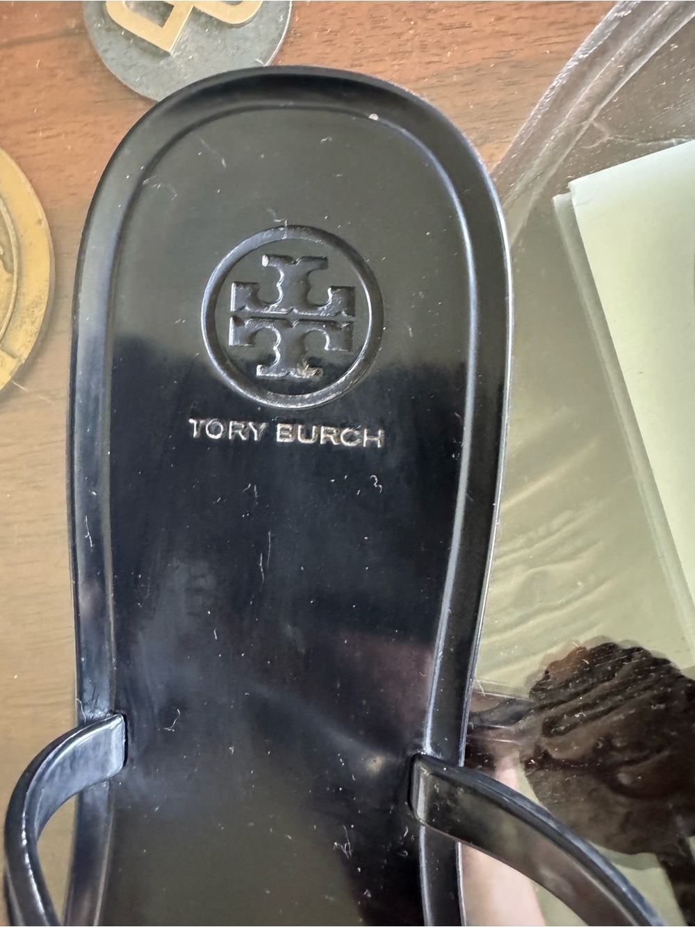 Tory Burch Black Jelly Thong Sandals with Gold Logo Rosette - Picture 15 of 16